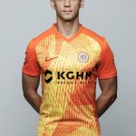 Bartosz Kopacz w pomaranczowej koszulce