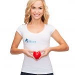 woman in blank white shirt with small red heart