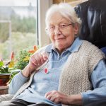 Elderly person with emergency button